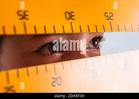 Pupil Using Ruler STEM disciplines. knowledge day. child pupil hold ruler. girl is ...