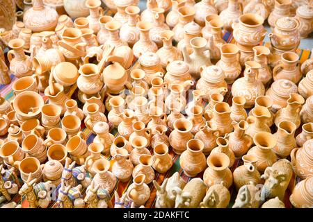 Clay jugs. Lots of ceramics for sale. Clay dishes. Stock Photo