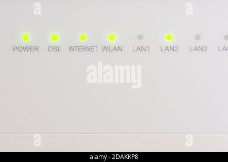 Modern white wireless internet router/modem led lights Stock Photo