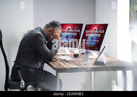Encrypted Files And Data Cyber Attack On Computer Stock Photo
