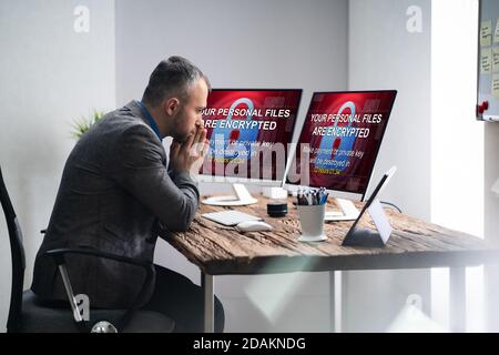 Encrypted Files And Data Cyber Attack On Computer Stock Photo