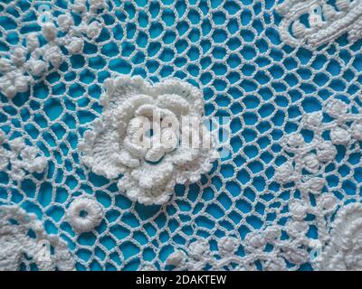 Irish lace crochet. The elements of white knitted dress. Stock Photo