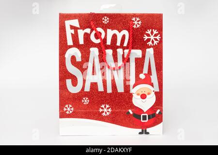 christmas gift bag covered in glitter Stock Photo