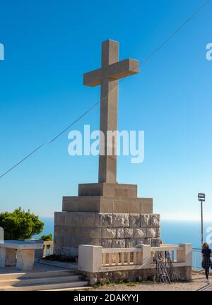 Huge Christian Cross monument on the Srd mountain above the town of Dubrovnik Croatia Stock Photo