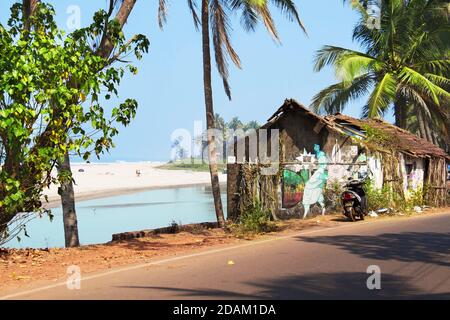 Street in Mandrem. View of the Arabian sea. March, 2016, North Goa, India Stock Photo