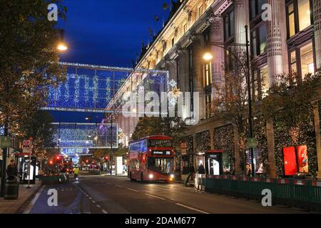 Christmas 'light curtains' on Oxford Street in 2020, the year of the coronavirus pandemic, while shops stay closed during the 2nd national lockdown, in central London, UK Stock Photo