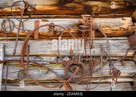 Rusty metal and weathered wood at historic Riddle Brothers Ranch on Steens Mountain in southeast Oregon. Stock Photo