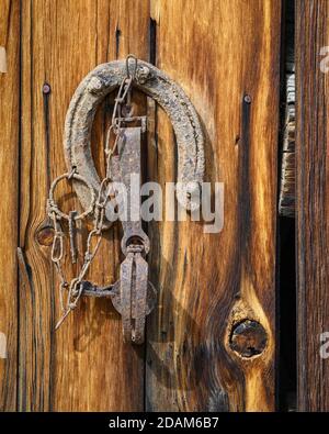 Rusty metal and weathered wood at historic Riddle Brothers Ranch on Steens Mountain in southeast Oregon. Stock Photo