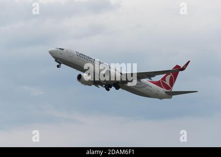 TRABZON, TURKEY - JULY 08, 2016: Turkish Airlines jet taking off from Trabzon airport in a windy weather. Stock Photo