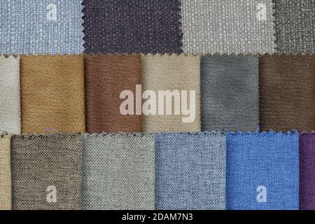 textile industry background. Set of multi-colored fabrics for furniture. Catalog of cloth from matting fabric texture background, cover fabric texture Stock Photo