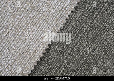 Fabric for furniture upholstery. textile industry background. Upholstery fabric in gray shades top view. sofa upholstery in diagonal lines texture. Stock Photo