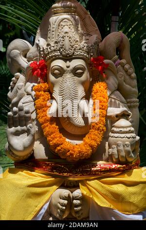 Adorned stone scultpure of HIndu elephant god deity Ganesh, Ubud, Bali, Indonesia Stock Photo