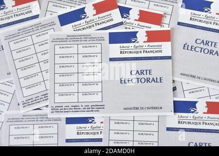 Marseille, France. 12th Nov, 2020. In this photo illustration French electoral cards seen displayed.Prime Minister Jean Castex takes up Jean-Louis Debre's proposal to postpone the departmental and regional elections from March to June 2021, due to the health crisis of the Covid-19. Credit: Gerard Bottino/SOPA Images/ZUMA Wire/Alamy Live News Stock Photo