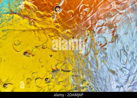 Abstract background made from oil reflecting light Stock Photo
