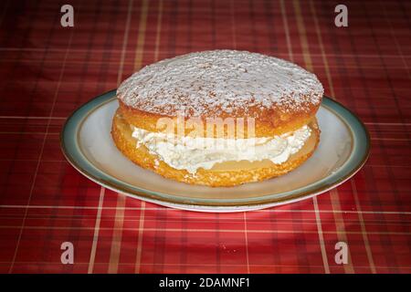 Whole lemon cream sponge cake. Stock Photo