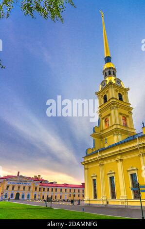 Saints Peter and Paul Cathedral Orthodox church with golden spire, Saint Petersburg Mint in Peter and Paul Fortress on Zayachy Hare Island, vertical v Stock Photo