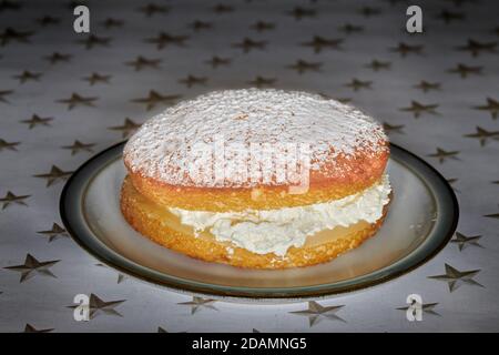 Whole lemon cream sponge cake. Stock Photo