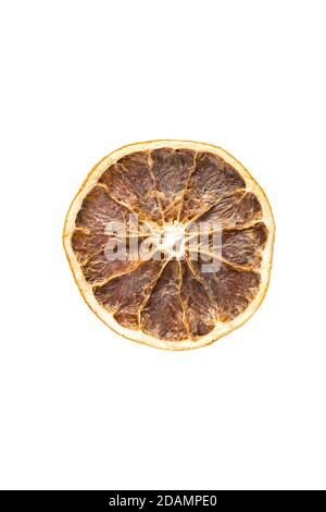 Round slice of dried orange on a white background, isolate. Christmas ornament, the smell of the new year. Added to beverages and baked goods. Home de Stock Photo