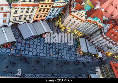 Prague, Czech Republic, May 13, 2019: Top view of Old Town Stare Mesto historical centre. Row of buildings with colorful facades and red tiled roofs on Old Town Square Staromestske namesti in evening Stock Photo