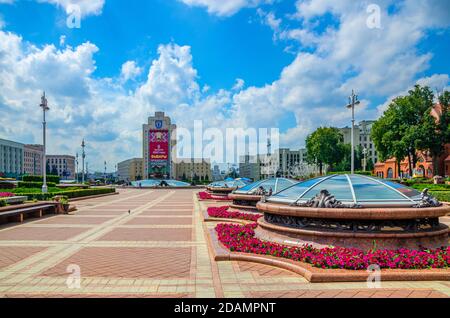 Minsk, Belarus, July 26, 2020: Maxim Tank Belarusian State Pedagogical University with Presidential elections huge advertising announcement poster and Government House building on Independence Square Stock Photo