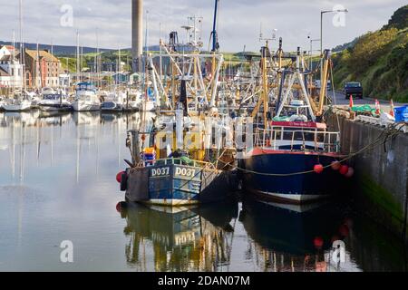 Fishing vessels moored in Peel harbour Stock Photo