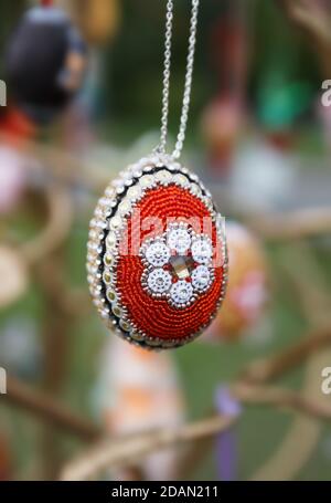 Easter holiday. Festival of Easter Eggs. Beautiful easter eggs made of multi-colored beads Stock Photo