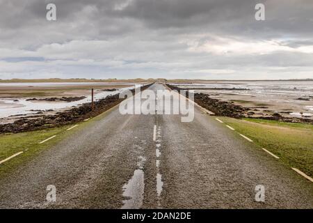 Lindisfarne Causeway  from the mainland to Holy Island. Stock Photo