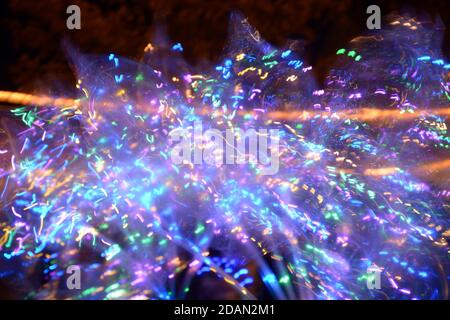 colorful neon lights background with blur and bokeh effect as future theme Stock Photo