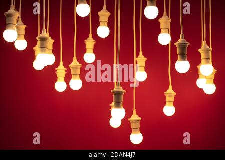light bulb ceiling hanging drop down lighting beautiful decoration for background. Stock Photo