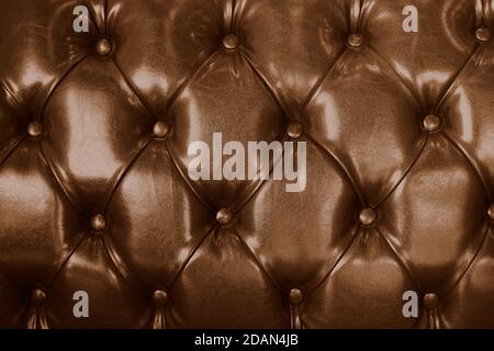 Sofa leather brown color vintage old texture furniture tile background. Stock Photo
