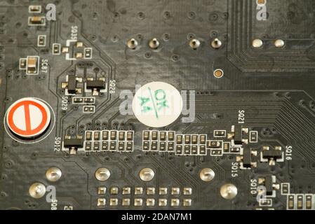 various chips on a textolite video card board for a modern desktop computer Stock Photo