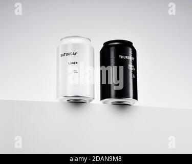 Two cans of lager beer by Bavarian brewery And Union on a ledge Stock Photo