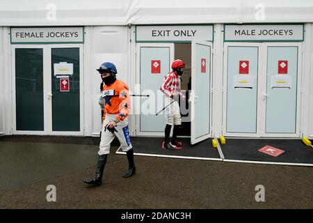 A general view as jockeys leave the temporary changing room for the parade ring during the Cheltenham November Meeting 2020 at Cheltenham Racecourse. Stock Photo