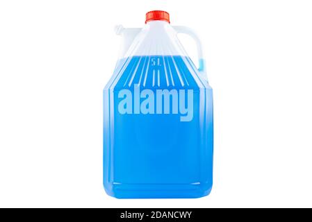 Winter blue windshield washer fluid in a five liter bottle, closed with a red cap, isolated on a white background with a clipping path. Stock Photo