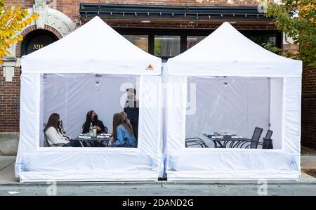 Washington, USA. 30th Oct, 2020. People dine inside a tent at Figo Wine Bar in Chicago, Illinois, the United States, Oct. 30, 2020. Credit: Joel Lerner/Xinhua/Alamy Live News Stock Photo