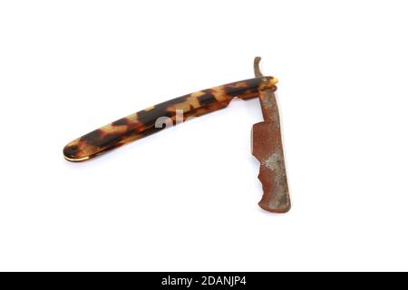 Old rusty razor isolated on white background Stock Photo
