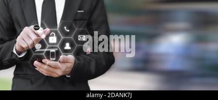Closeup image of businessman pressing unlock icon on mobile phone with copy space. Idea for connection social media in smartphone. Stock Photo