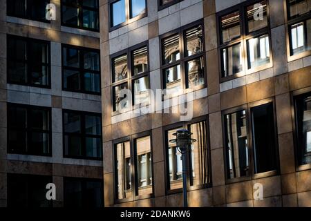 sun shining on facade of modern building Stock Photo