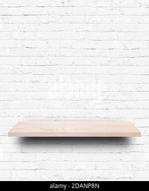 Empty wooden shelf on white brick wall background. Stock Photo