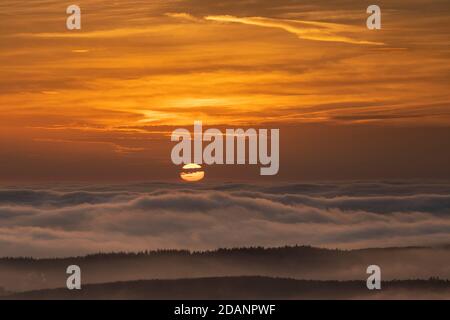 Sunrise over fog shrouded hills, Clwydian Range, North Wales Stock Photo