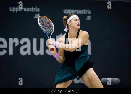 Aryna Sabalenka of Belarus in action against Oceane Dodin of France during the quarter-final at the 2020 Upper Austria Ladies Linz / LM Stock Photo