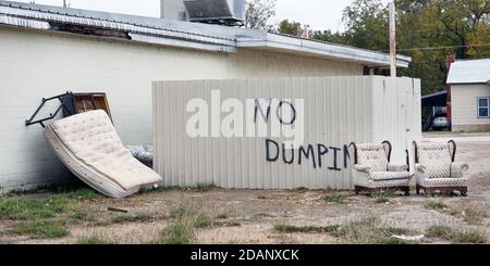 No dumping of trash that has lots of dumped trash. Stock Photo