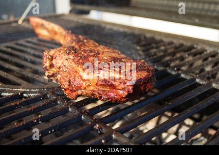 Dry Aged Barbecue Tomahawk Steak on grill Stock Photo