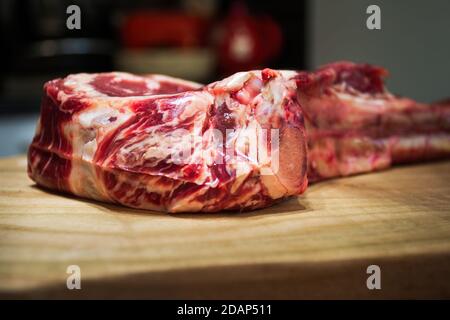 Raw Dry Aged Barbecue Tomahawk Steak ready for grill Stock Photo