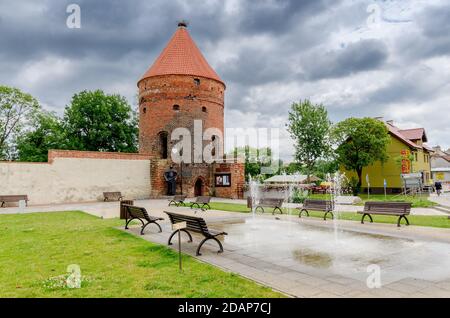 DOBRE MIASTO, WARMIAN-MAZURIAN PROVINCE, POLAND; ger. Guttstadt, the gothic Stork Tower, remains of the medieval city walls. Stock Photo