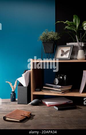 Notebook in brown leather cover lying on wooden table surrounded by other stuff Stock Photo