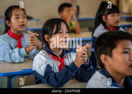 (201114) -- KUNMING, Nov. 14, 2020 (Xinhua) -- Students attend a class at a school in Daxingdi Township of Lushui City, southwest China's Yunnan Province, Nov. 5, 2020. Southwest China's Yunnan Province, which had the country's largest remaining poor population at the end of last year, has eradicated absolute poverty, officials said on Saturday. The last nine counties in the province were delisted from the poverty-stricken county list, which meant all its 88 poverty-stricken counties have shaken off poverty, said Huang Yunbo, director of the provincial poverty alleviation office. It als Stock Photo