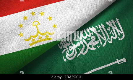 Tajikistan and Saudi Arabia flags textile cloth Stock Photo