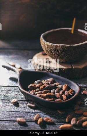 Cocoa concept with raw cacao cocoa beans. Stock Photo