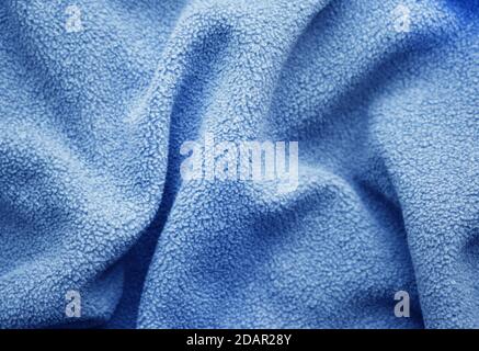 Plush blue micro fleece background. Stock Photo